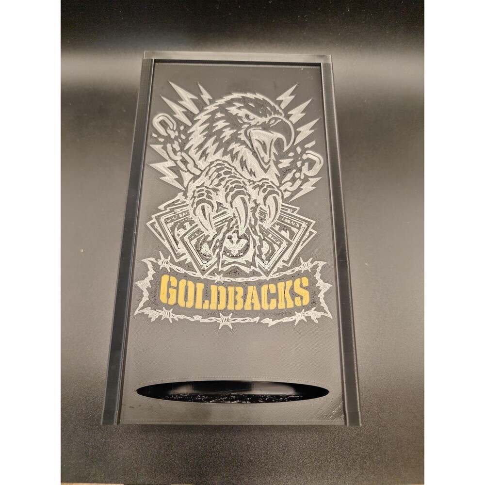 Goldbacks and money box